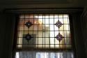 voorgevel 1e verdieping glas- in lood bovenlicht